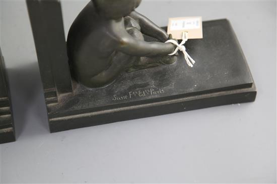 Paul Silvestre (French 1884-1976). A pair of early 20th century patinated bronze bookends, Susse Freres, Paris, length 8.25in. Paul Silvestre (French 1884-1976). A pair of early 20th century patinated bronze bookends, Susse Freres, Paris, length 8.25in.